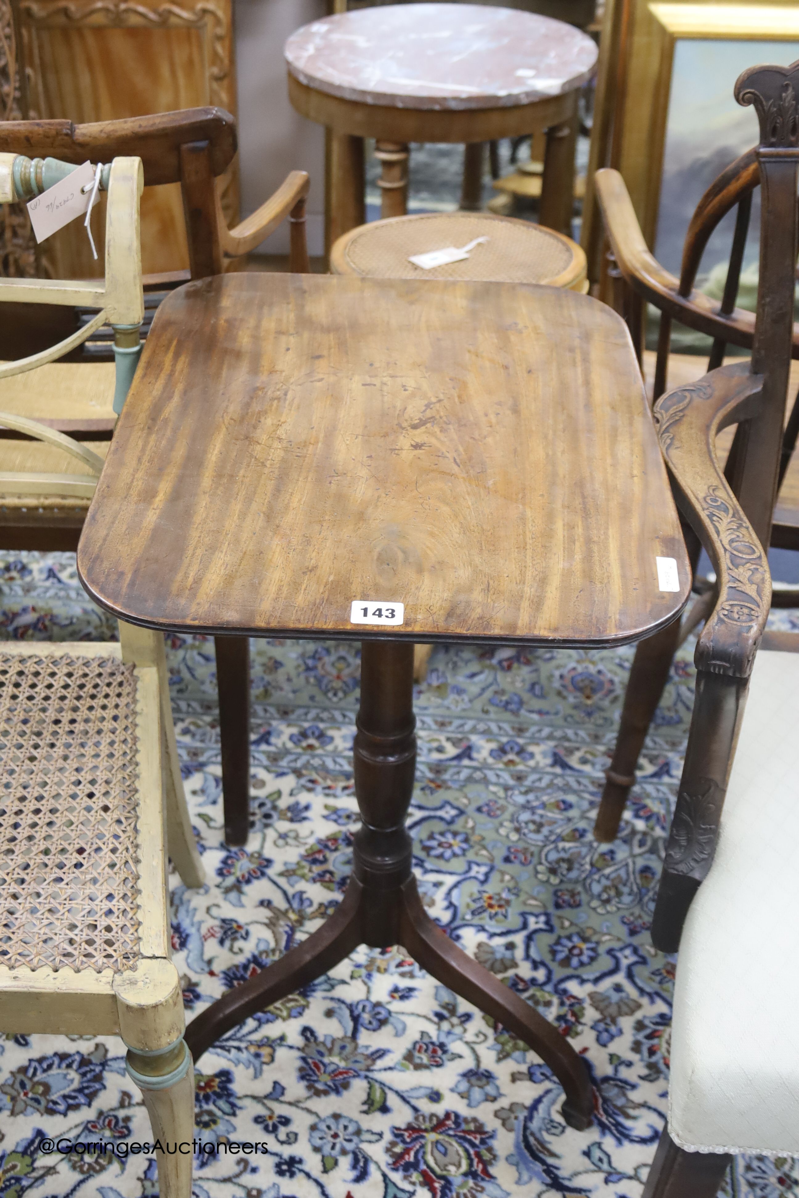 An early 19th century mahogany occasional table with rectangular tilt top, width 50cm depth 39cm height 69cm